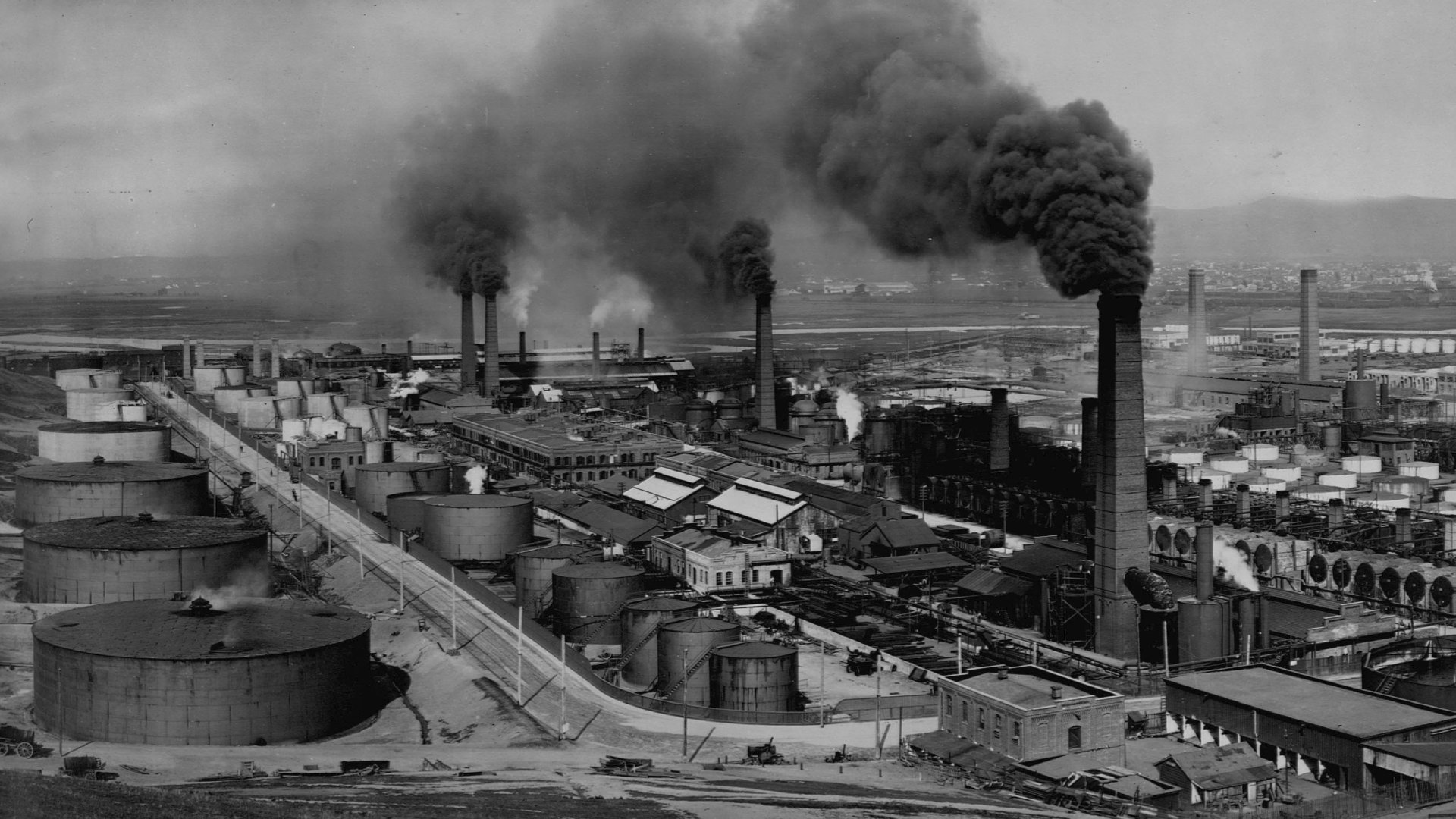 The History and Evolution of Motor Oil The history of industrial oil is closely linked to the development of the chemical industry and to technological advancements in petroleum refining. In the early stages of this process, products obtained from the refining of crude oil — known today as «mineral oils» — were used to lubricate industrial equipment. The production of lubricants began almost simultaneously with the industrial use of petroleum — in 1859, long before the invention of the automobile and before it was discovered that petroleum was suitable as a fuel for internal combustion engines. One of the major problems of the first mineral oils was their rapid wear, caused by the evaporation of certain light fractions essential for lubrication when exposed to heat. On the other hand, many of these oils could not be used in winter due to their high content of heavy paraffin hydrocarbons, which solidified at low temperatures. To address these problems, one of the directions of chemists’ research was the search for suitable substances to improve the properties of oils that had lost their qualities as a result of mechanical, chemical, and thermal effects, as well as contamination by combustion products. This was how the first oil additives appeared — substances which, when applied in specific quantities, altered the properties of the oils, thereby defining a production formula that remains relevant to this day: a mixture of base oils and additives, comprising approximately 80%. In 1947, the American Petroleum Institute introduced its first specifications, dividing oils into three classes: Regular (containing only pure mineral oil), Premium (with oxidation inhibitors), and Heavy Duty (with oxidation inhibitors plus detergent additives). All these varieties were produced using Group I Base oils, which remain a principal product category to this day — including in the operations of «Caspian Lubricants Recycling». Mühərrik yağlarının tarixi və texnoloji inkişafı Sürtkü yağlarının tarixi, kimya sənayesinin inkişafı və neftin emalı proseslərində əldə olunan texnoloji nailiyyətlərlə sıx bağlıdır. Bu prosesin ilkin mərhələsində neftin emalı nəticəsində əldə edilən məhsullar — bu gün «mineral yağlar» adlandırdığımız maddələr — sənaye avadanlıqlarının yağlanması üçün istifadə olunurdu. Sənaye yağlarının istehsalı, neftin sənaye miqyasında istifadəsi ilə eyni dövrdə — 1859‑cu ildə, avtomobilin ixtirasından əvvəl və benzinin daxili yanma mühərrikləri üçün yanacaq kimi yararlı olduğu kəşf edildiyi vaxtda başlamışdır. İlk mineral yağların əsas çatışmazlıqlarından biri onların tez köhnəlməyə məruz qalması idi. Bunun səbəbi isə yağlama üçün vacib hesab olunan bəzi yüngül fraksiyaların qızdırıldıqda buxarlanması idi. Digər tərəfdən, bu yağların əksəriyyətindən qış mövsümündə istifadə mümkün olmurdu, çünki tərkibindəki ağır parafin karbohidrogenləri aşağı temperaturda bərkiyirdi. Bu problemlərin aradan qaldırılması məqsədilə kimyaçıların apardığı tədqiqatlar mexaniki, kimyəvi və istilik təsirləri, həmçinin yanma məhsulları ilə çirklənmə nəticəsində keyfiyyətini itirən yağların yaxşılaşdıracaq əlavələrin axtarışı idi. Beləliklə, müəyyən miqdarda tətbiq edildikdə yağların xüsusiyyətlərini dəyişdirən ilk əlavələr ortaya çıxdı. Bu isə bu gün də aktuallığını qoruyan istehsal formulunu, təxminən 80%-ə qədər baza yağları və əlavələrin qarışığını, müəyyənləşdirdi. 1947‑ci ildə Amerika Neft İnstitutu ilk spesifikasiyalarını təqdim edərək yağları üç sinfə ayırdı: Regular — yalnız təmiz mineral yağdan ibarət; Premium — oksidləşmə inhibitorları əlavə olunmuş; Heavy Duty — oksidləşmə inhibitorları ilə yanaşı dispersiyaedici əlavələr də olan. Bütün bu məhsullar uzun illərdir Qrup I baza yağlarından hazırlanır və bu yağlar «Caspian Lubricants Recycling»-in fəaliyyətində də geniş istifadə olunur. История и технологическое развитие моторных маселИстория и технологическое развитие моторных масел История индустриальных масел тесно связана с совершенствованием процессов нефтепереработки и развитием химической промышленности. В первые годы их развития, промышленное оборудование смазывалось простыми продуктами переработки сырой нефти, то есть маслами исключительно минерального происхождения. Производство смазочных масел началось практически одновременно с промышленным использованием нефти – в 1859 году, задолго до изобретения автомобиля и начала использования бензина в качестве топлива для двигателей внутреннего сгорания. Одной из многочисленных проблем первых минеральных масел было их быстрое изнашивание, поскольку некоторые лёгкие компоненты, важные для смазочных процессов, испарялись при нагревании. С другой стороны, многие из этих масел нельзя было использовать зимой из-за высокого содержания тяжёлых парафиновых углеводородов, которые затвердевали при низких температурах. Для решения этих проблем, исследования химиков были направлены на поиск подходящих веществ, которые могли бы улучшить свойства масел и предотвратить их преждевременное изнашивание в результате механического, химического, термического воздействия и насыщения продуктами сгорания. Так появились первые присадки к маслам, которые при применении в определённых количествах изменяли их свойства, тем самым определив формулу производства масел, актуальную и по сей день – смесь базовых масел и присадок (примерно до 80%). В 1947 году Американский институт нефти представил свои первые комплексные спецификации, разделив масла на три вида: Regular (содержащие только чистое минеральное масло), Premium (с добавлением ингибиторов окисления) и Heavy Duty (с ингибиторами окисления и диспергирующими присадками). Впрочем, все разновидности производились на основе базовых масел группы I, остающихся основными категориями продукции и по сей день, в том числе и в деятельности «Caspian Lubricants Recycling».